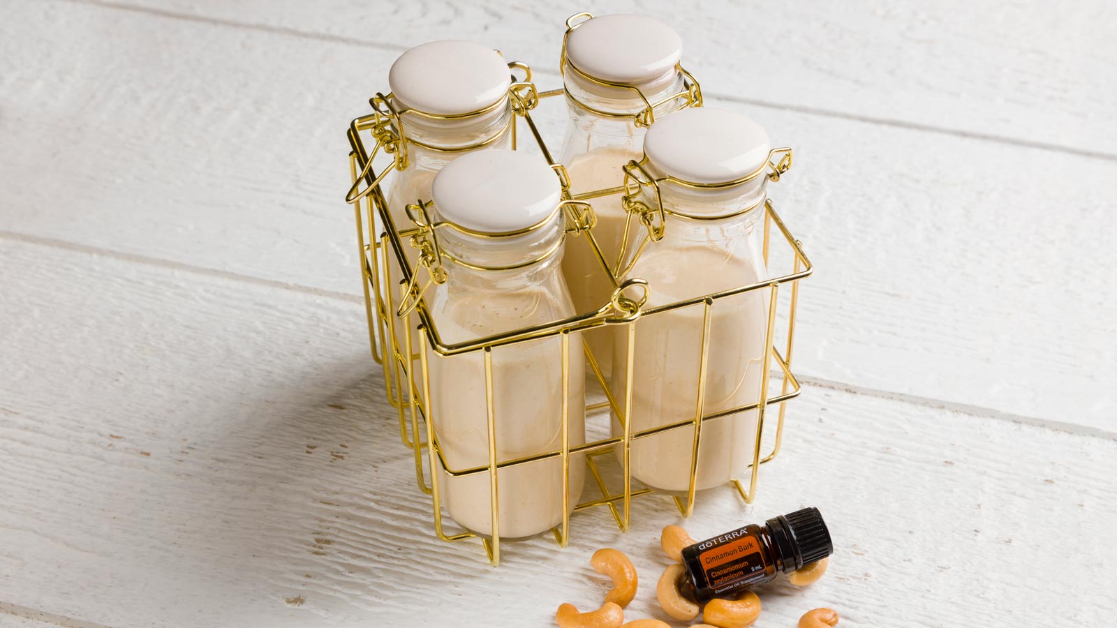 https://www.doterra.com/medias/16x9-1600x900-cashew-nut-milk-us-en-web.jpg?context=bWFzdGVyfGltYWdlc3wxNTE2NjJ8aW1hZ2UvanBlZ3xpbWFnZXMvaDYxL2hlZS85MTY4Njk2OTAxNjYyLmpwZ3xmYzcyZTgxNjVhNDNkN2Y1NGQ1ZWRjMzgxYmE4Mjg2ODg1YmM0ODI0ODJlNTJiZTg3NjNhMWI0ODY4NzNjYzg5